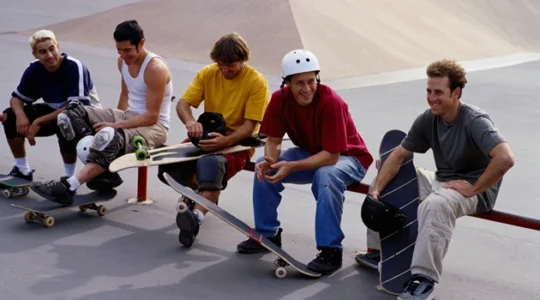 group of friends skateboarding
